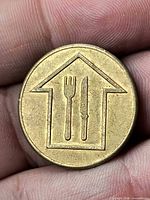 Obverse with fork and knife design