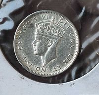 Obverse of 1942 Newfoundland 10¢ coin showing King George VI in flip