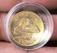 Obverse view showing Timon image and lettering