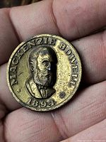 Obverse with portrait of Mackenzie Bowell and date 1894