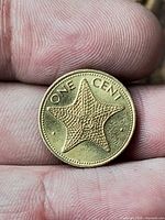 Obverse showing starfish design and ONE CENT legend