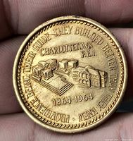 Obverse showing buildings, dates and inscriptions