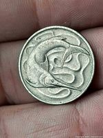 Reverse of coin showing swordfish design