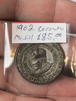 Obverse view of medallion in 2×2 flip showing King Edward VII bust and surrounding legend