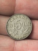 Reverse showing CANADA FIVE CENTS 1922 with maple leaves