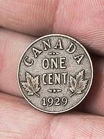 Reverse of 1929 Canada one cent coin with CANADA ONE CENT 1929 and maple leaves