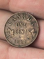 Reverse of 1931 Canada 1¢ showing date and maple leaves