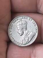 Obverse showing King George V portrait and lettering GEORGIVS V DEI GRA REX ET IND IMP