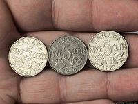 Obverse view of all three coins showing dates 1933, 1929, 1927