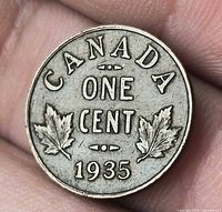 Reverse of 1935 Canada one-cent coin showing CANADA ONE CENT 1935 with maple leaves