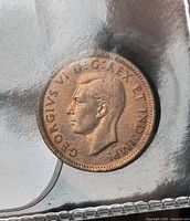 Obverse showing King George VI profile and legend