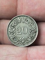 Reverse showing value 20 and oak wreath