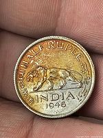 Reverse of 1946 India half rupee showing walking tiger and legends
