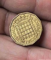 Reverse showing portcullis design and date 1964