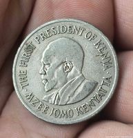 Obverse showing portrait of Jomo Kenyatta with surrounding legend