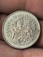 Reverse showing Canadian Coat of Arms and date 1988