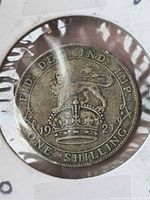 Reverse side showing crowned lion, date 1921 and ONE SHILLING legend