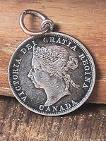 Obverse of coin pendant with Queen Victoria portrait and visible bail