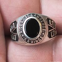 Front view showing bezel text and onyx stone