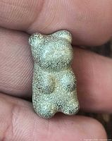Front view of textured pewter gummy bear sculpture