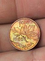 Reverse showing toned Maple Leaf design and date