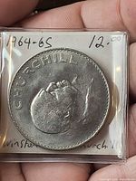 Reverse side with CHURCHILL legend and bust