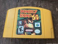 Front view of Donkey Kong 64 yellow cartridge with label