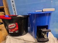 Both buckets side by side on surface