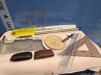 Overall view of drafting tools on surface