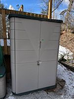 Front view of Rubbermaid storage shed closed