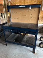 Full view of Mastercraft workbench with pegboard, drawers and shelf
