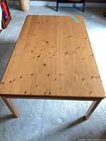 top view of pine coffee table showing surface and legs