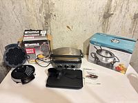 All three appliances with boxes visible