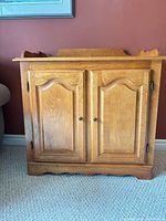 Front view of credenza showing doors and finish