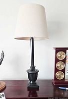 Full view of table lamp with shade