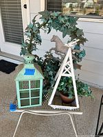 Full group showing all four decor items on patio table