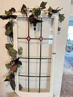 Full view of stained glass panel in frame