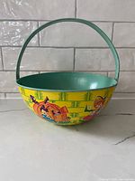 Side view showing basket shape, handle, interior color