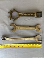 Top view of all three wrenches with ruler for scale
