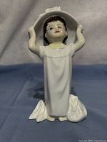 Front view of Royal Doulton Make Believe figurine