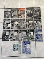 17 magazines front covers arranged on floor