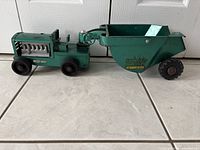 Side view of Structo Rocker pressed steel tractor and bucket
