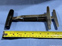 Full view of chopper with tape measure showing length