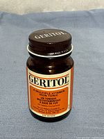 Front view of Geritol bottle showing label and cap