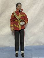 Full-length front view of Michael Jackson Thriller doll displaying entire outfit and stature