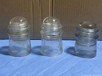 Front view of the three glass insulators