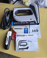 Arrow electric stapler, staple remover, staples box and manual grouped