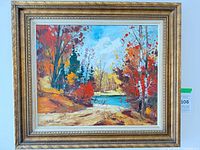 Full view of framed painting showing subject and signature