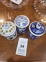 All three lidded jars side by side