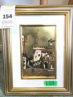 Full view of framed artwork with frame and mat visible